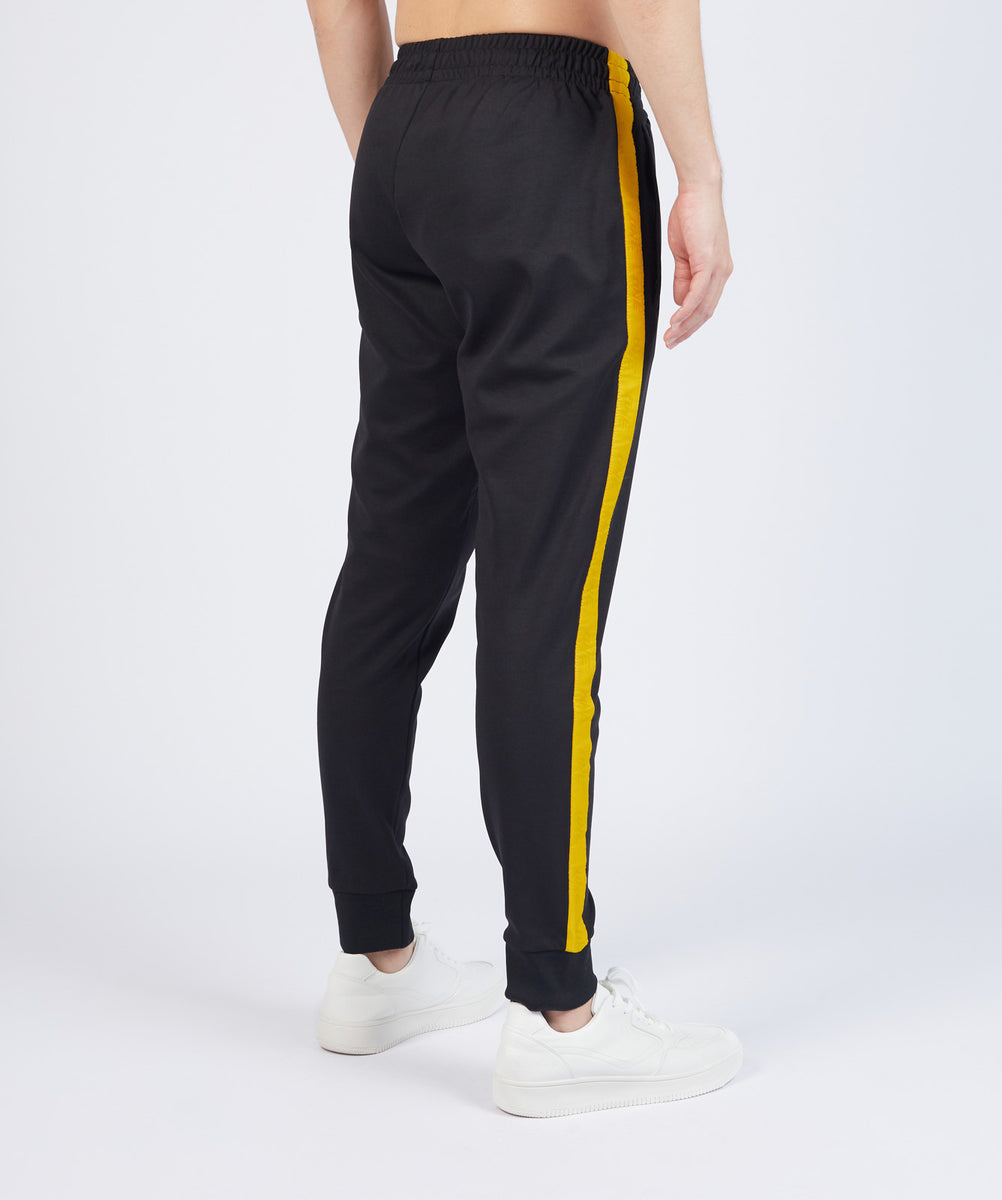 Black and sales yellow adidas joggers